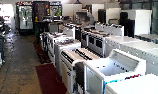 Appliances being worked on in the Mobile Fridge Repairs workshop